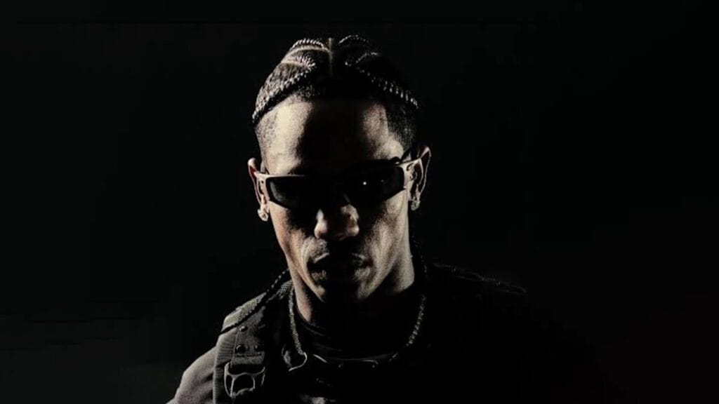 Travis Scott usando o novo óculos Oakley X-Metal Juliet em foto oficial de estúdio.