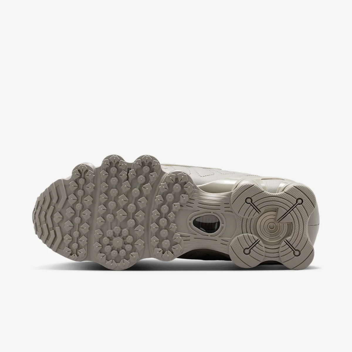 Sola do Nike Shox TL vista de baixo, com as colunas aparentes