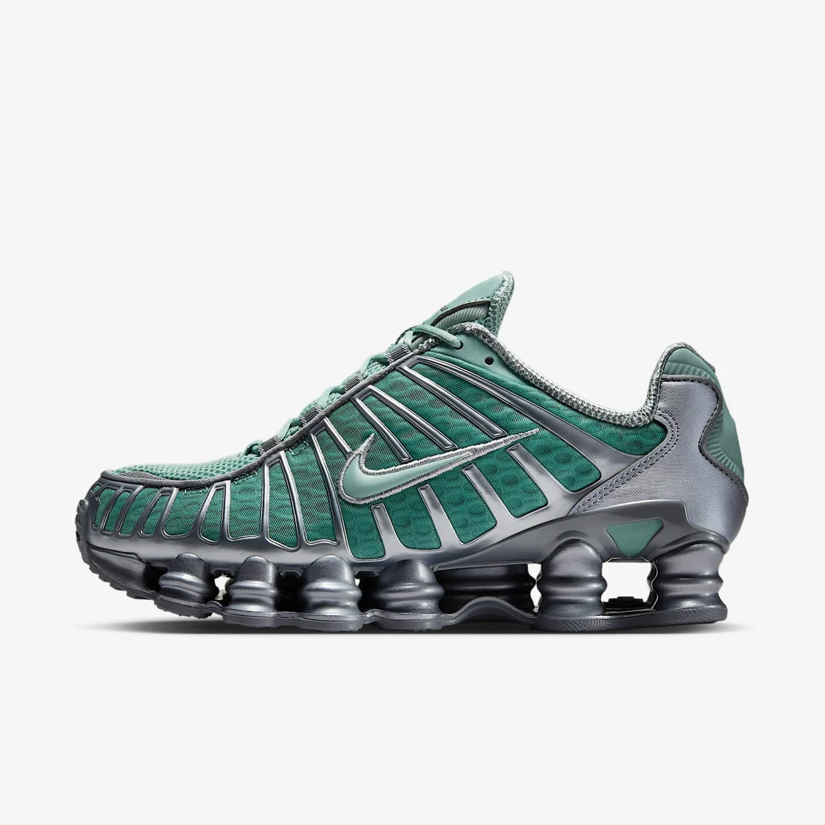 Nike Shox TL verde e prata visto de lado, com as 12 colunas