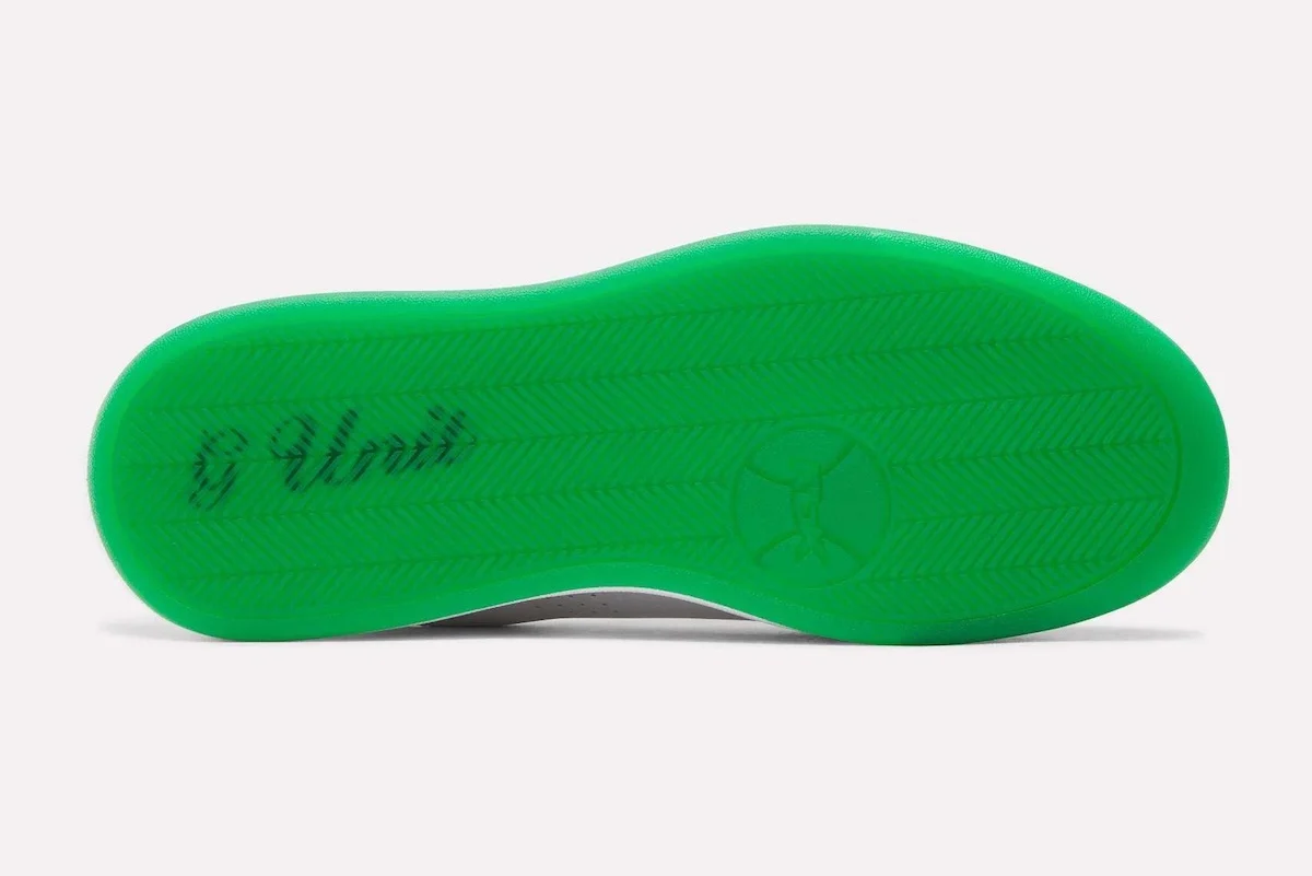 Solado verde do Reebok G-Unit G6 com a inscrição G Unit
